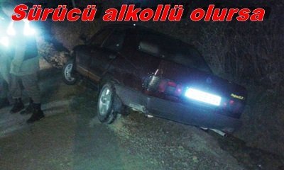 YOLDAN ÇIKAN OTOMOBİL YAN YATTI