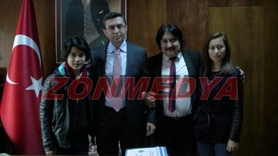 (ÖZEL HABER) SANATÇI ERCAN GÖNÜLTAŞ KAYMAKAM KEÇELİYİ ZİYARET ETTİ(GÖRÜNTÜLÜ)