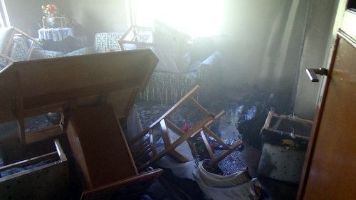 EV? YANAN KADIN HASTANEL?K OLDU