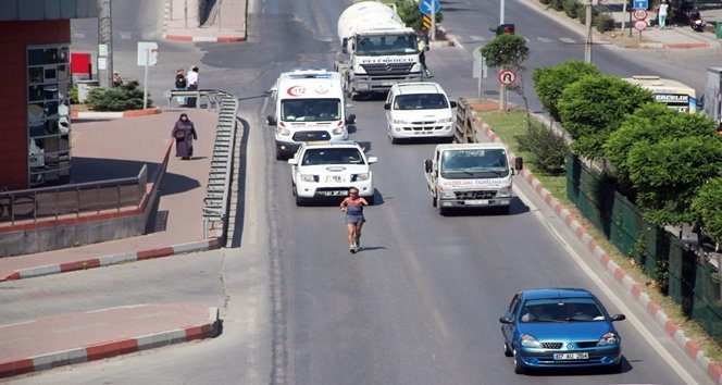 KOŞAN ADAM LAKAPLI MİLLİ ATLET KEMAL ÖZDEMİR, TERMİK SANTRALLER İÇİN KOŞTU. (SERTAÇ ÖZDEMİR/ZONGULDAK-İHA)