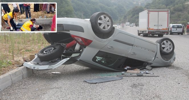 OTOMOBİL TAKLA ATTI: 2 YARALI