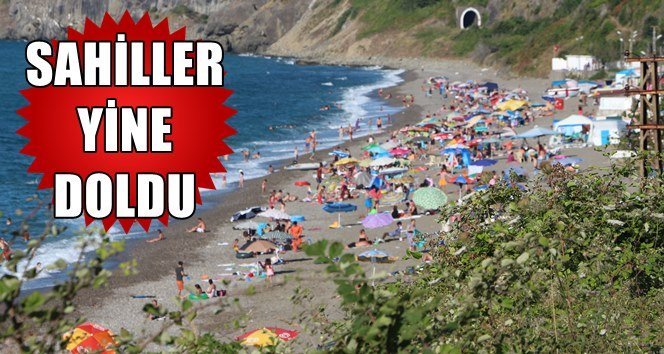 Dalgalara aldırış etmediler, sahili doldurdular