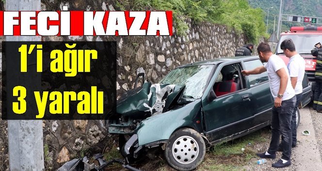 Yoldan çıkan otomobil direğe ve duvara çarptı